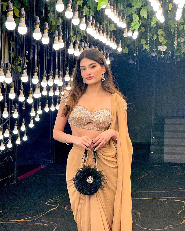 Medha Das Sharma in Nude Drape Saree With Bralette Blouse & Tasseled Sleeves